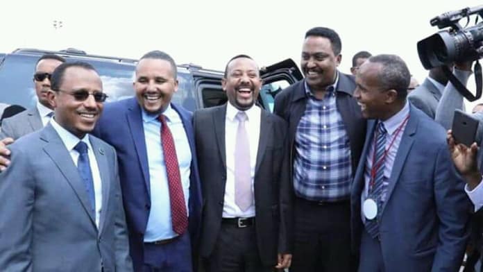Reception of Prime Minister Abiy Ahmed during his visit to the U.S. shorty after he assumed power: (From left to right)Lemma Megeressa, Jawar Mohammed, Abiy Ahmed and Workneh Gebeyehu.